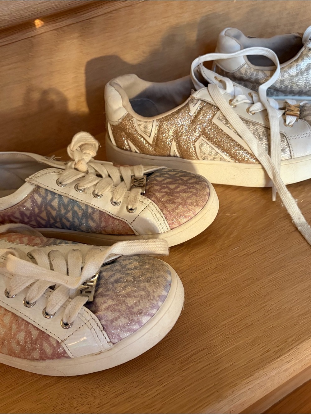 2 pairs of Michael Kors kids Pink Purple and Gold Logo Low-Top Sneakers